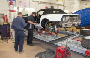 Man working on restoring the 1 millionth Chevy Corvette
