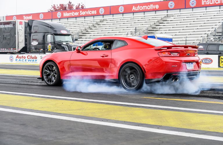 2017 Chevy Camaro ZL1 red coupe on the race track