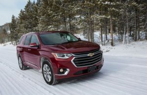 2018 Chevy Traverse red on the road