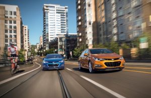 2018 Chevy Cruze blue and yellow on the road