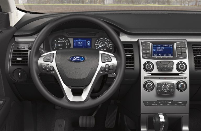 front interior of 2019 ford flex including steering wheel and infotainment system