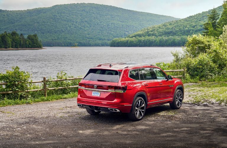 Red 2024 VW Atlas Rear Exterior by a Lake