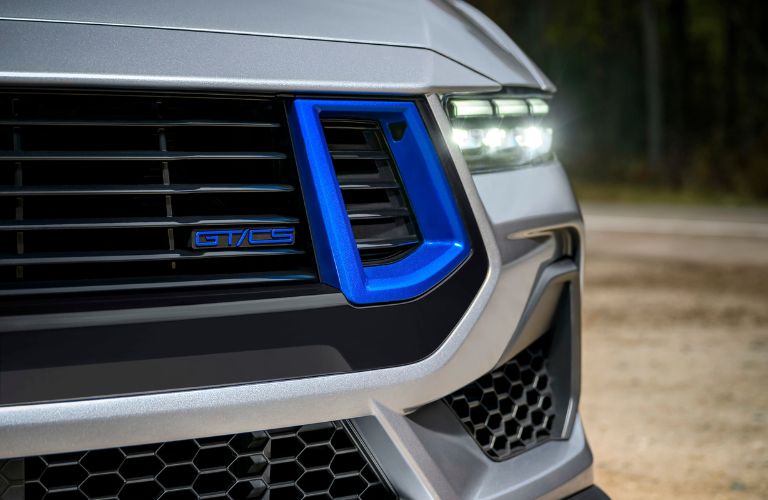 Close Up of Rave Blue Accents on the 2024 Ford Mustang California Special Grille